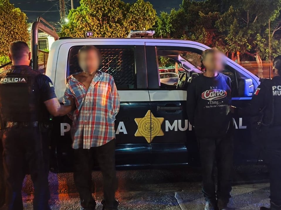 ¿QUÉ BUSCABAN? Detienen a dos hombres por causar daños en los cristales de un banco en Desarrollo San Pablo